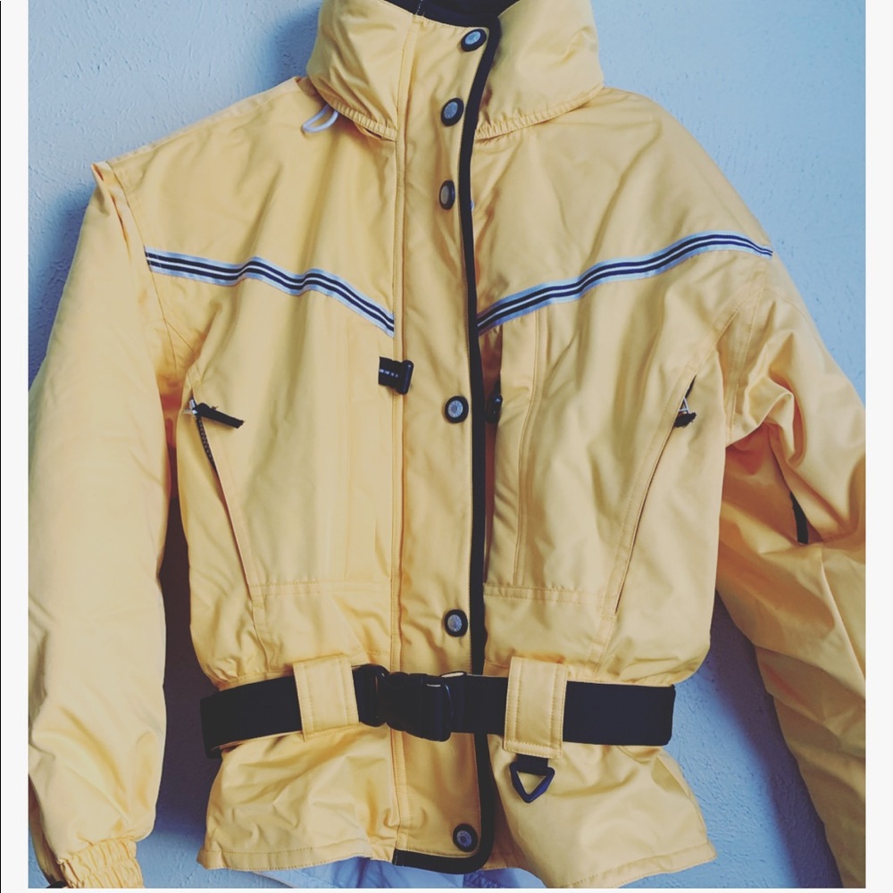 Yellow Obermeyer puff snow jacket.